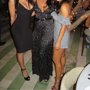 Nasty Gal Black Jumpsuit with White Stars. Wide leg zipper back